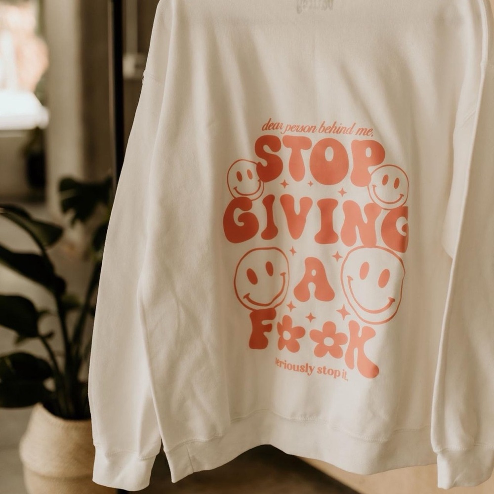 White Sweatshirt with Pink Graphic Print